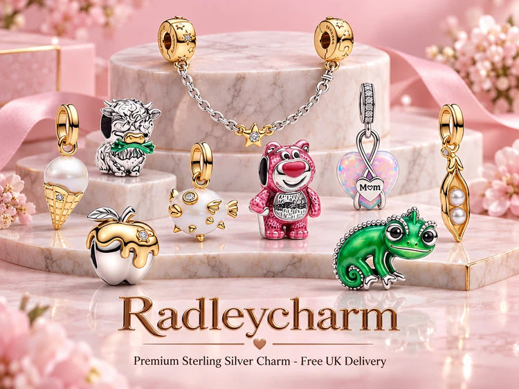 Radleycharm premium sterling silver charms on a pink marble display